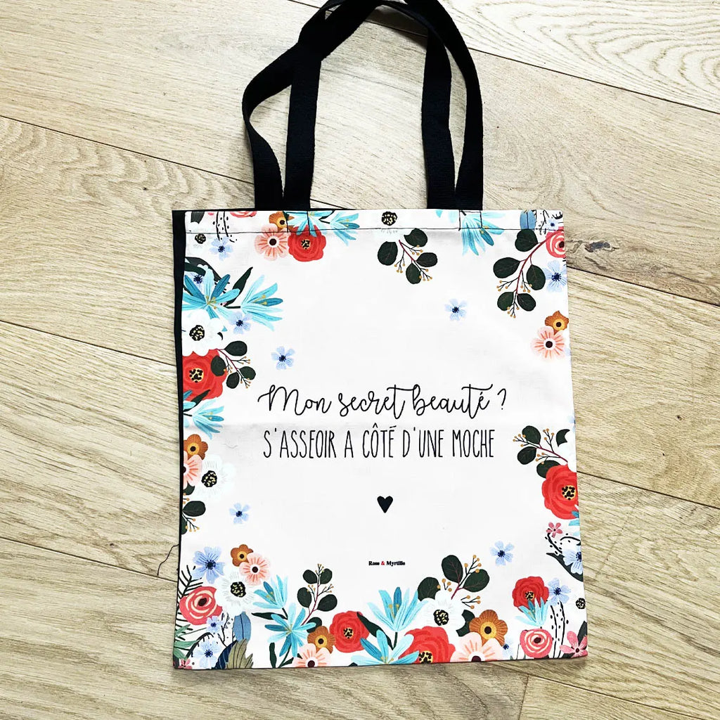 Tote bag illustré citation humour secret beauté fleurs colorées
